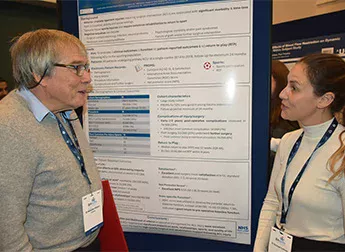Discussing a poster